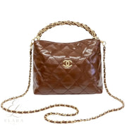Chanel | Quilted Braided Handle Chain Hobo Brown Leather Bag – product image 1