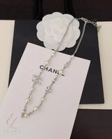 Chanel | Pearl Strand With Integrated Crystal-Encrusted Logo Jewelry – product image 5