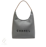 Chanel | Deauville Canvas Tote Brown Leather Bag – product image 1