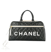 Chanel | Quilted Leather CC Logos Boston Hand Bag – Black – product image 1