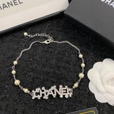 Chanel | Pearl Strand With Integrated Crystal-Encrusted Logo Jewelry – product image 4
