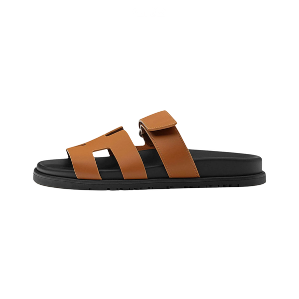 Hermès | Chypre Brown Calfskin Black Sole Slides