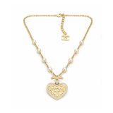 Chanel | Quilted Heart CC Logo Pearl Station Necklace – product image 1