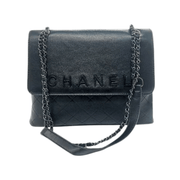 Chanel | Flap With A Chain Holder Bag – Black – product image 1