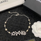 Chanel | Pearl Strand With Integrated Crystal-Encrusted Logo Jewelry – product image 3