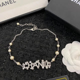 Chanel | Pearl Strand With Integrated Crystal-Encrusted Logo Jewelry – product image 3